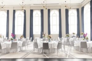 Elegant wedding reception at The Kimpton Pittman Hotel with natural light